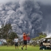 Golfer in front of a valcano in Hawaii.